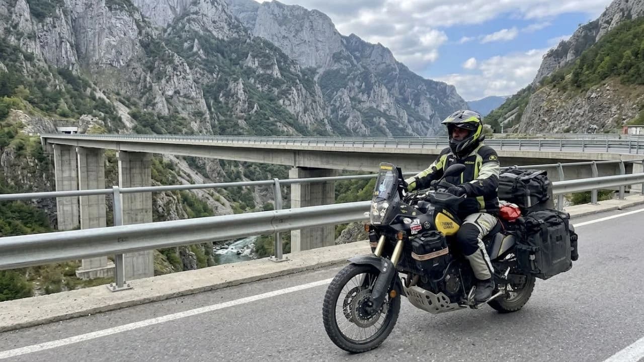 Motorcycle leaning into the Transfagarasan curves, Romania
