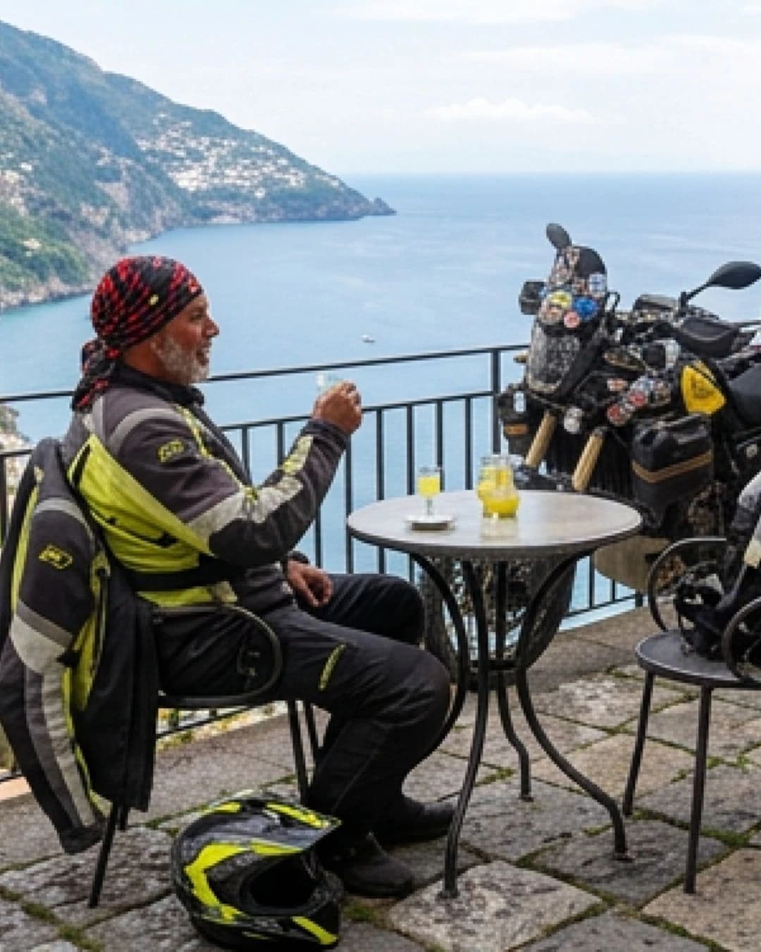 Tight cliff curves above the sea on the SS163, Italy