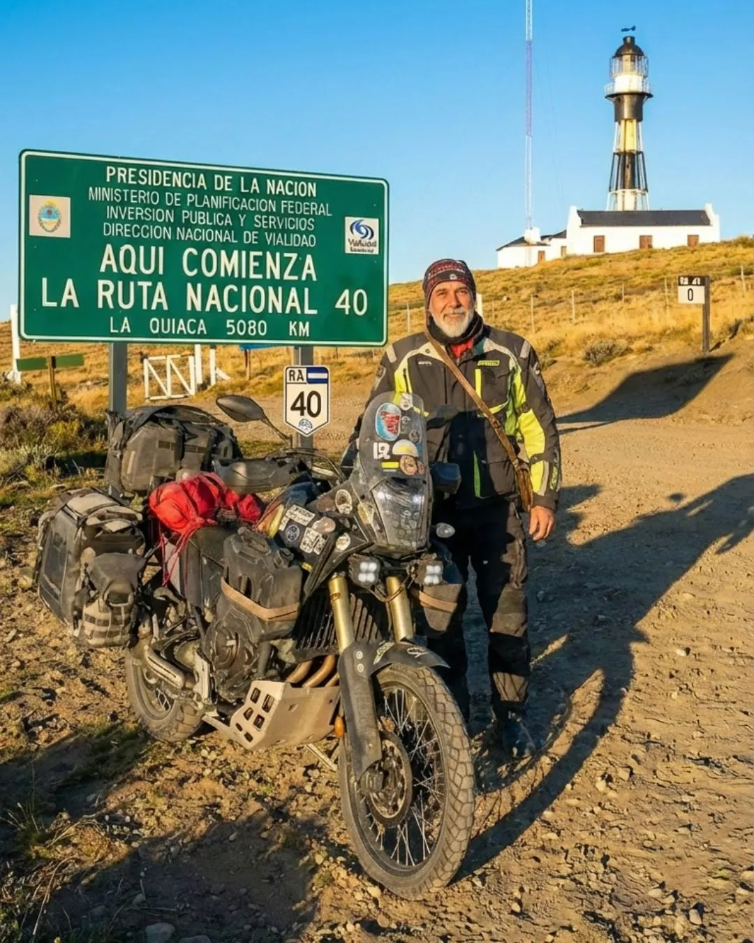Motorcycle dwarfed by the vastness of Route 40